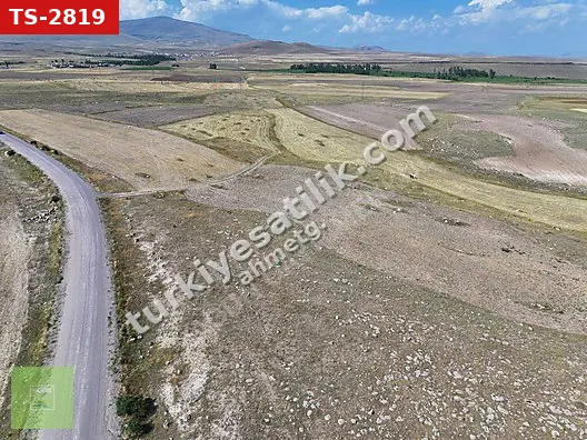 KARS DİGOR DOLAYLI'DA MEVKİİ KÖYÜSTÜ, DÜMDÜZ 11.963,61 M² TARLA